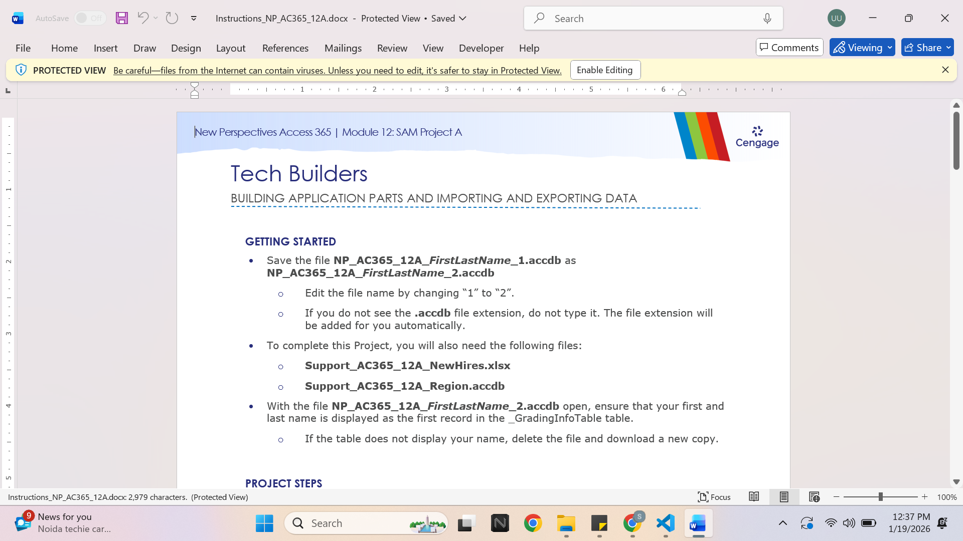 Laptop and spreadsheet workspace