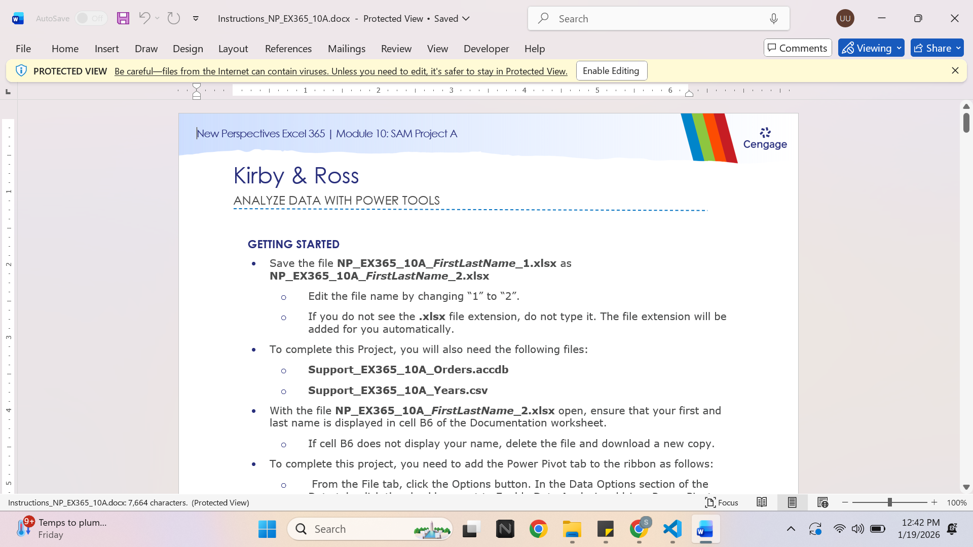 Laptop and spreadsheet workspace