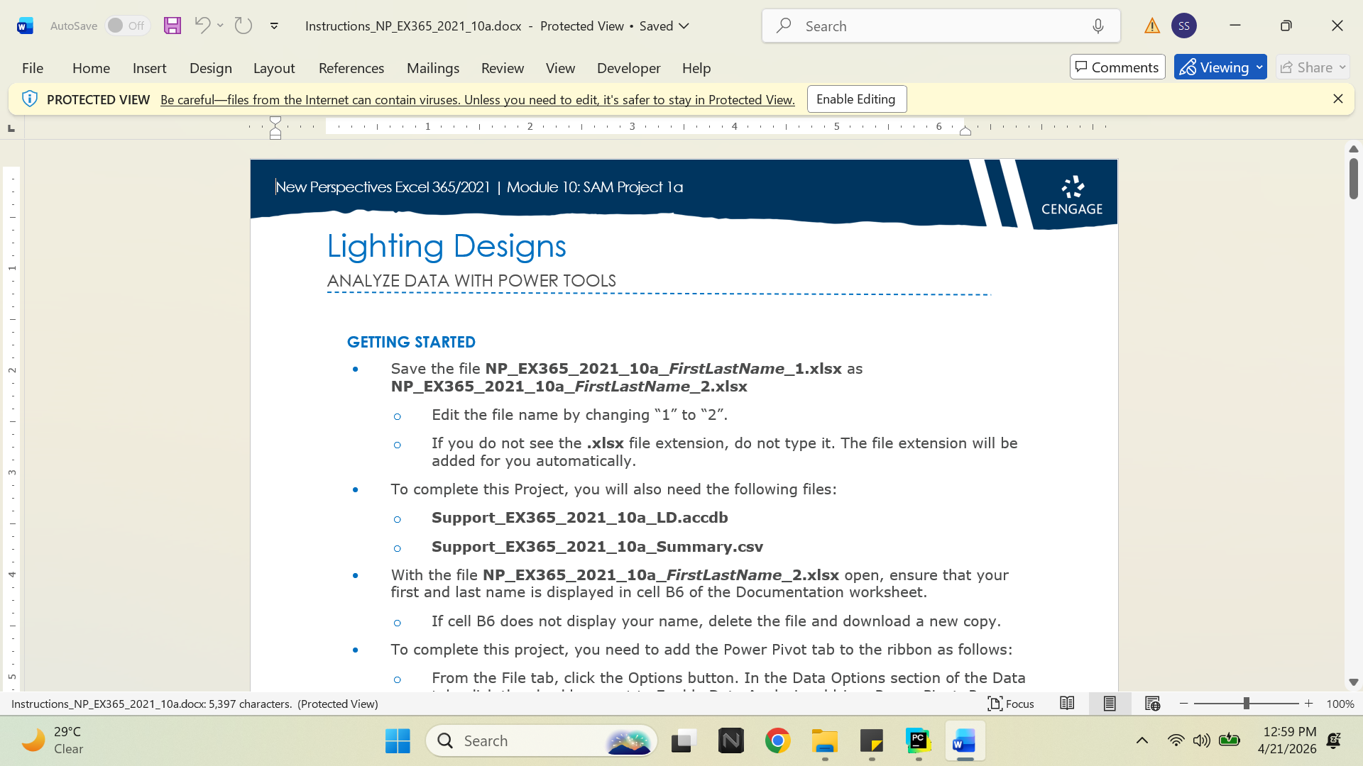 Laptop and spreadsheet workspace