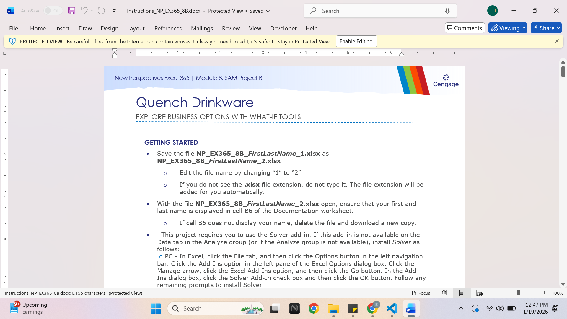 Laptop and spreadsheet workspace
