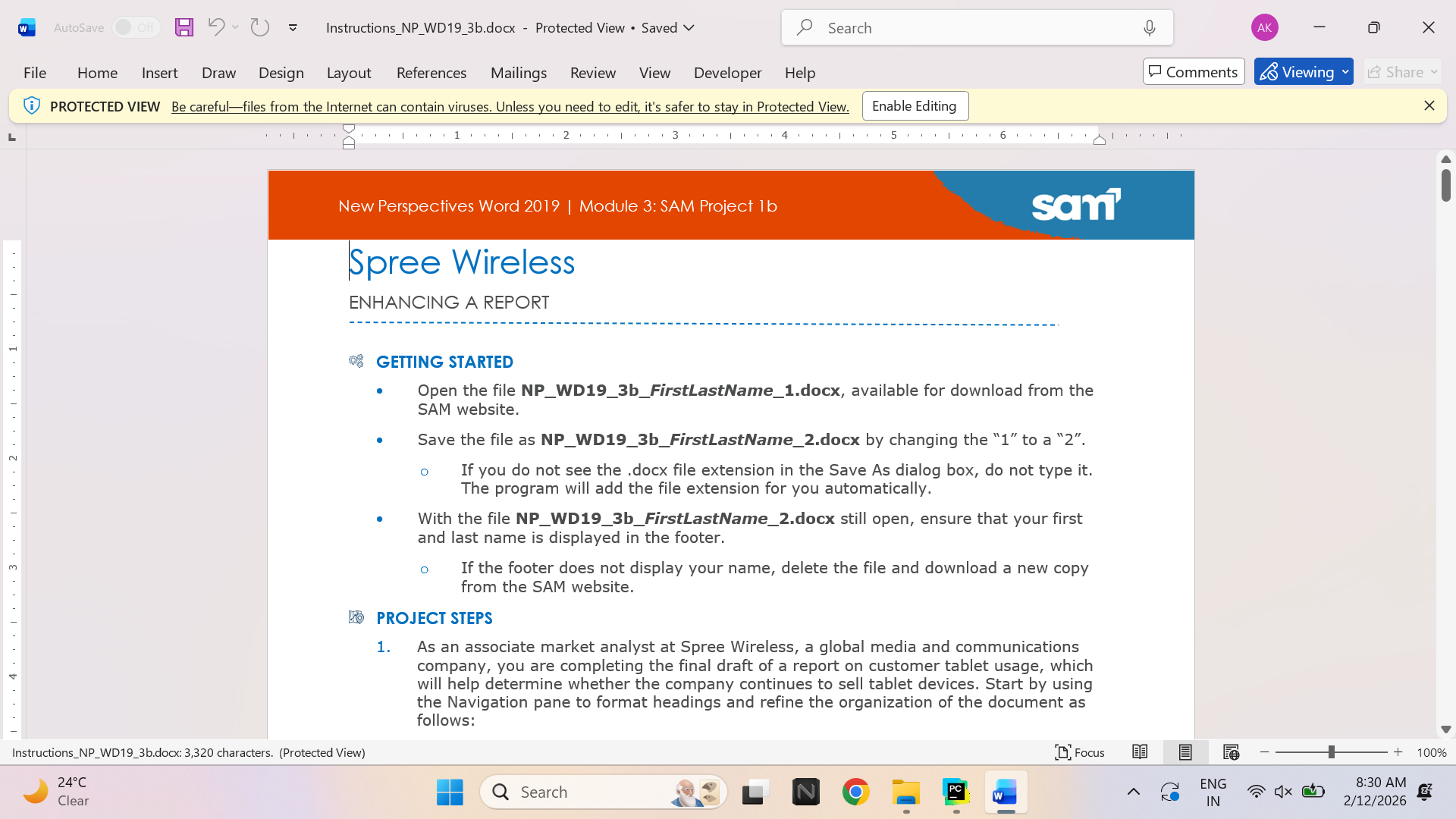 Laptop and spreadsheet workspace