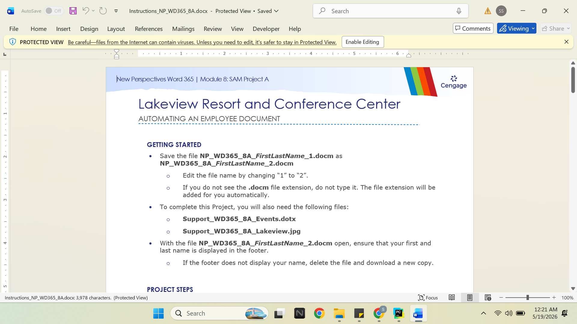 Laptop and spreadsheet workspace