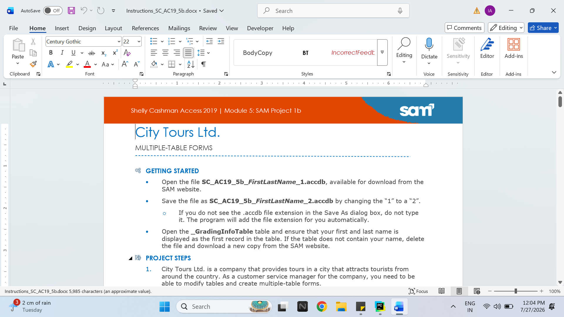 Laptop and spreadsheet workspace