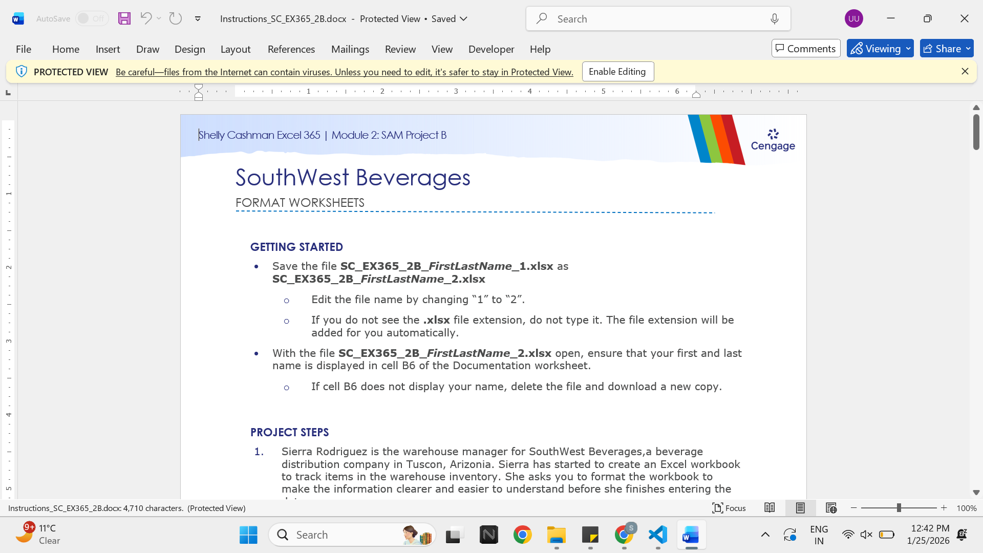 Laptop and spreadsheet workspace