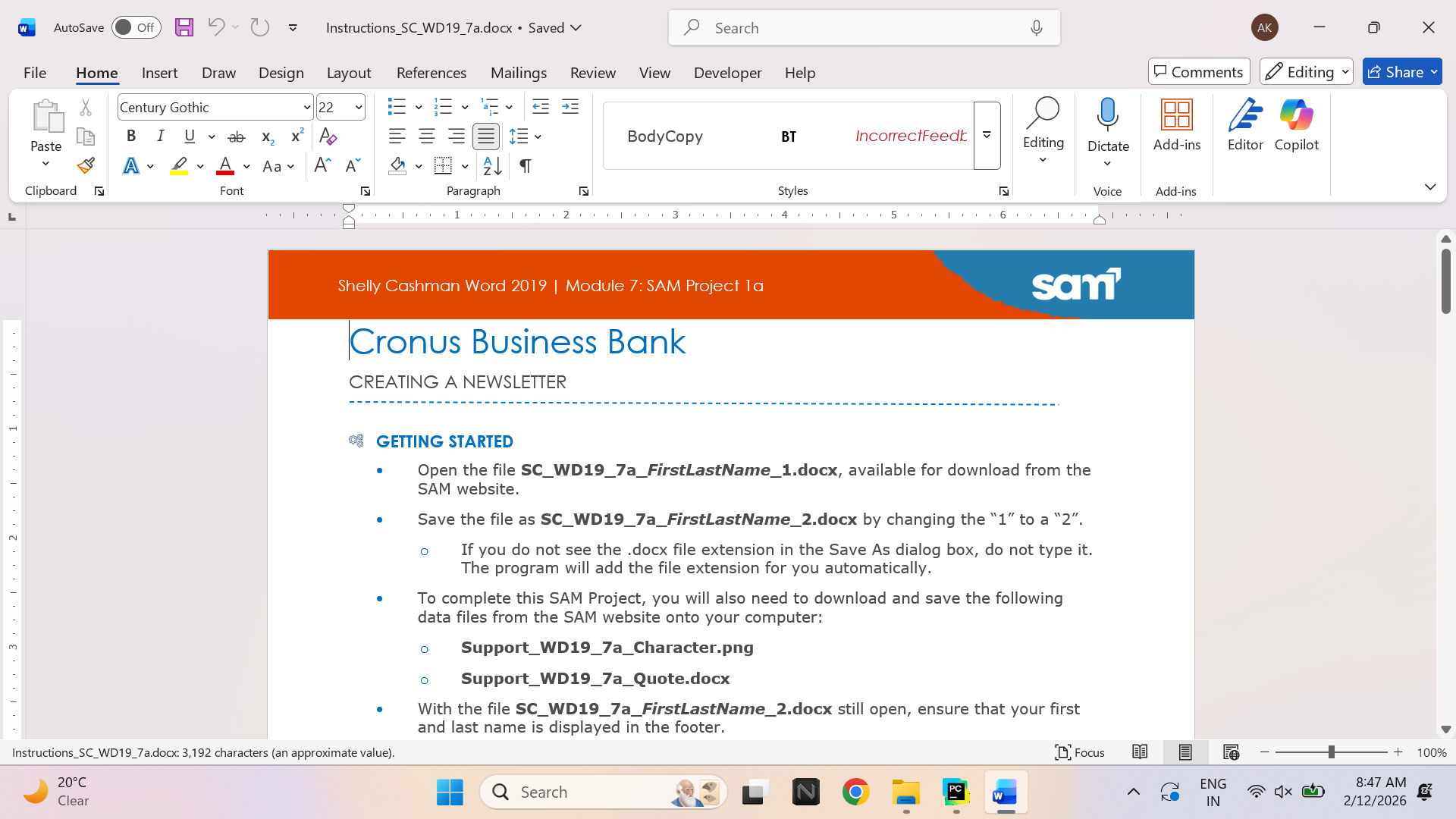 Laptop and spreadsheet workspace