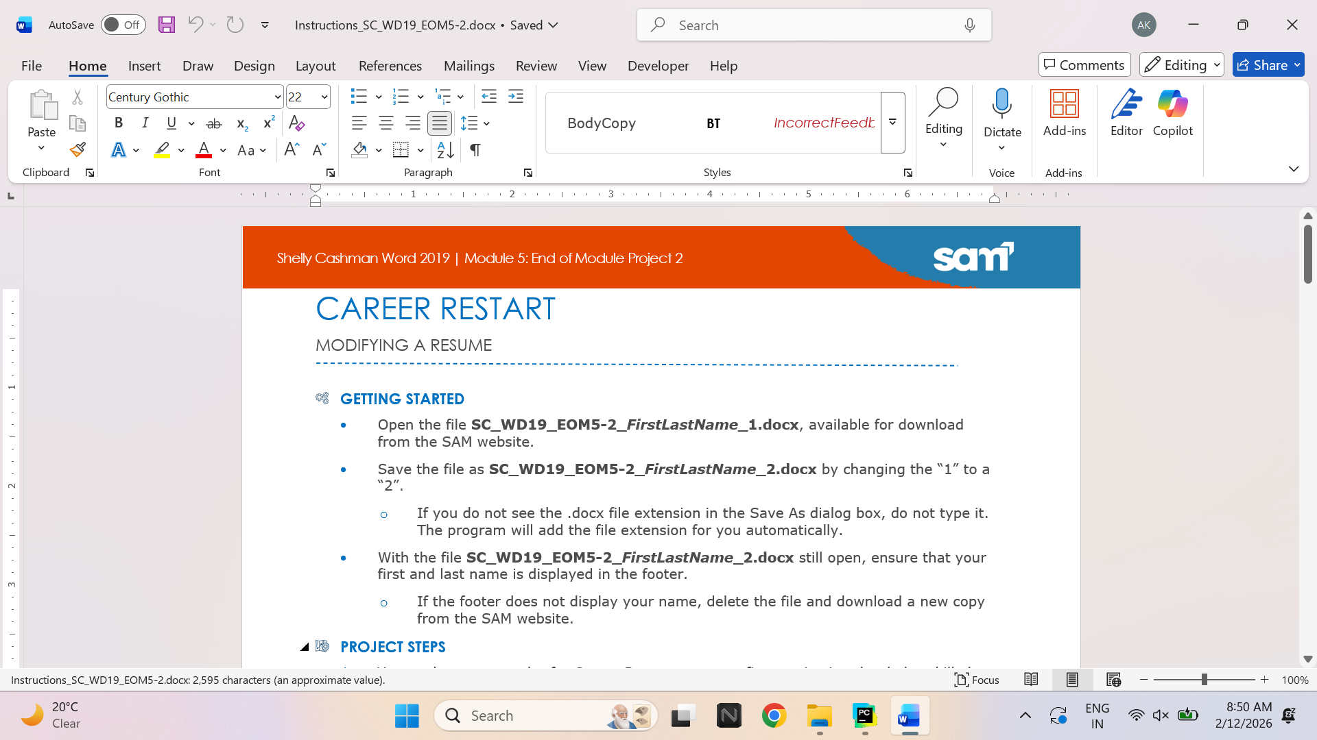 Laptop and spreadsheet workspace